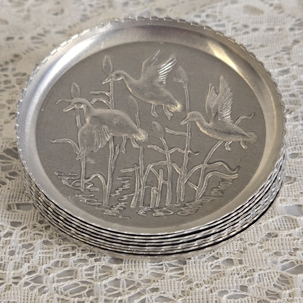 Vintage Silver Aluminum Bird Coasters – Set of 8 (3.25”)